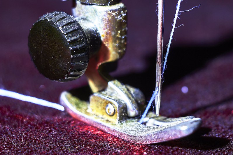 1950's sewing machine presser foot and needle.